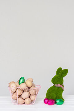 Green bunny with easter eggs