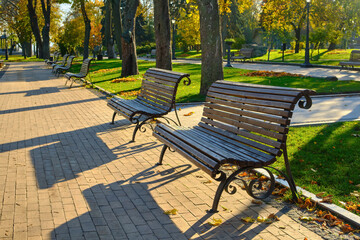 Colorful Autumn Park with Empty Benches