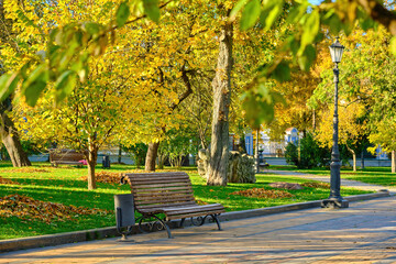 Colorful Autumn Park with Empty Benches