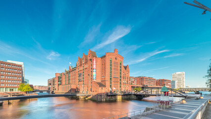 Obraz premium Famous old Speicherstadt in Hamburg timelapse hyperlapse featuring the International Maritime Museum, Germany