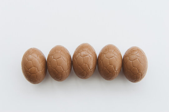 Five easter eggs on white background