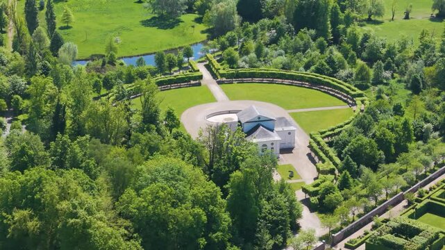ch&acirc;teau seneffe along theater building surrounding areas presence green trees water bodies enhances natural left to right pans aerial of de belgium 