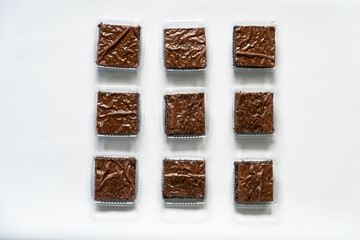 Three Individually Packaged Brownies in Horizontal Display