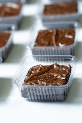 Rowed Display of Packaged Brownies in Bakery Setting