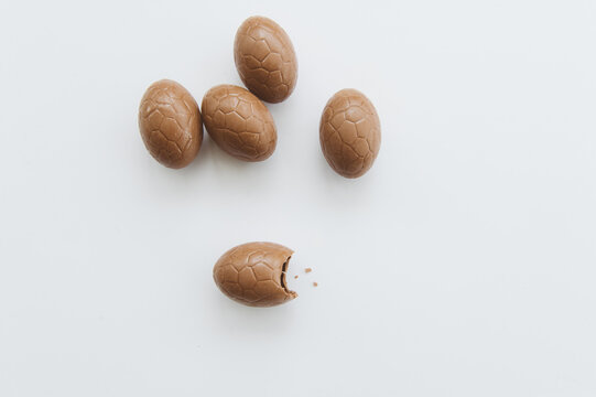 Five easter eggs on white background