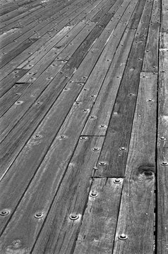 Close up of an old wooden road bridge