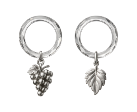 Crystal wine glass markers featuring delicate charms, adding sophistication to a formal dining room setting.