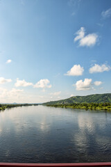 The Ussuri River. View from the bridge to the river, tributary of the great Amur River.. River front. Boardwalk, river embankment, quiet water
