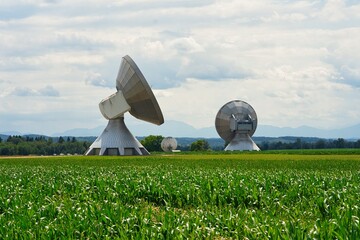 Satellite dish, Raisting Satellite Earth Station, satellite communications, big size satellite dish antennas under sky, Germany.
