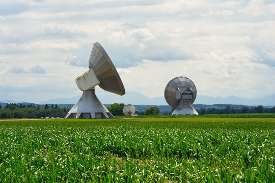 Satellite dish, Raisting Satellite Earth Station, satellite communications, big size satellite dish antennas under sky, Germany.