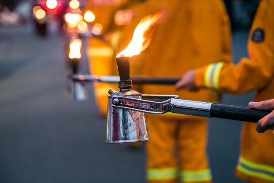 Flaming torches in a parade