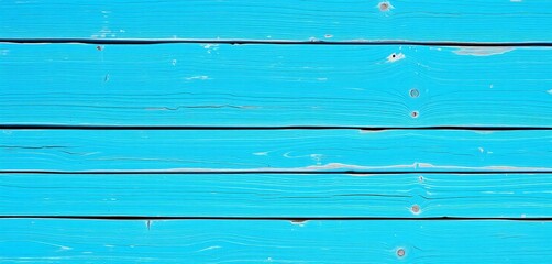 Naklejka premium Distressed blue-painted wood planks, showing grain and texture, blue wood, sea