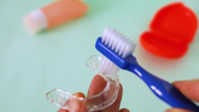 How to Clean a Bruxism Mouth Guard with a Brush. Dental Splint Hygiene and Care Routine