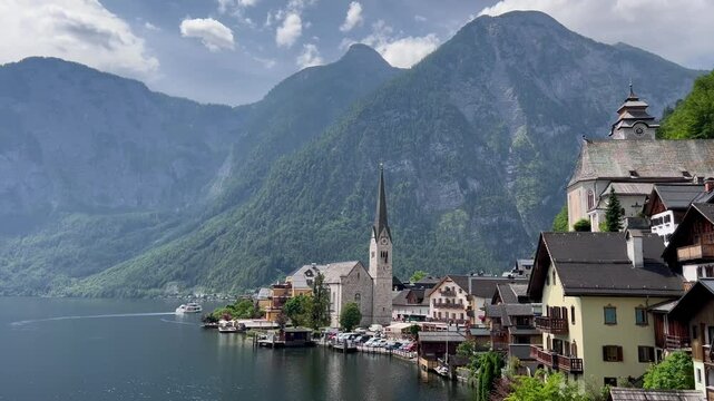 Scenic view of Hallstatt, Austria. A peaceful lakeside village nestled among large mountains.