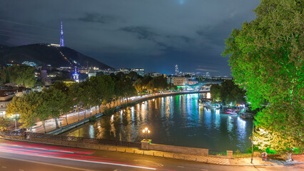 Bridge of Peace night timelapse, a bow-shaped pedestrian bridge in Tbilisi, Georgia © HyperlapsePro