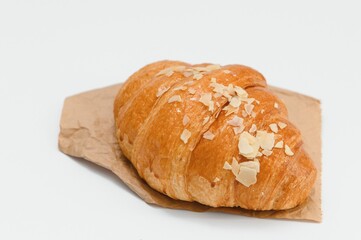 fresh baked croissant isolated on white background