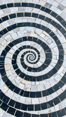 Black and white spiral mosaic tile pattern background texture optical illusion art