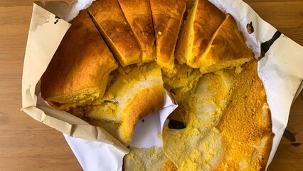 Golden slices of cornbread glistening like Aztec sunlight, celebrating Southern harvest and Dia de...