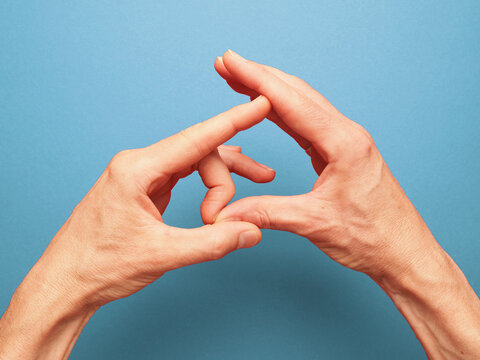 Hand position for mudra no. 5 in Jin Shin Jyutsu, alternative healing method or self-help concept