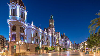 Valencia City Hall or Ajuntament de Valencia day to night timelapse hyperlapse in Plaza de Ayuntamiento. Spain