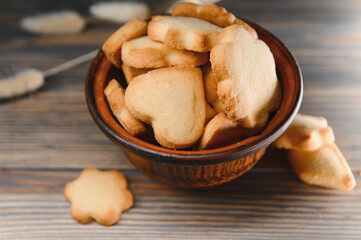 Fresh pastries. Delicious cookies on a wooden background