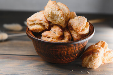 Fresh pastries. Delicious cookies on a wooden background