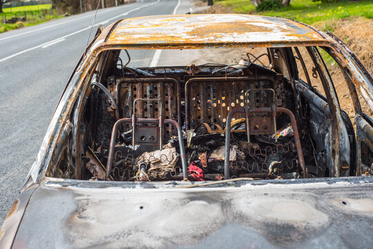 burnt out stolen car abandonded on the roadside
