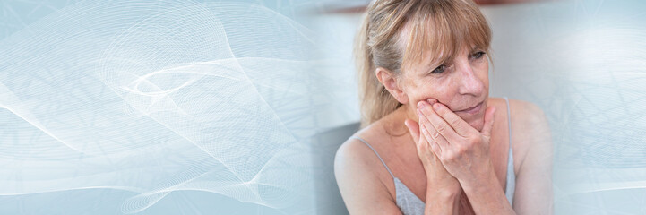Mature woman suffering from toothache; panoramic banner