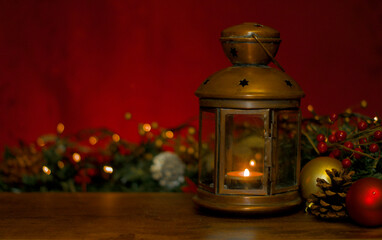 A cozy holiday scene featuring a warm copper lantern with a burning candle, festive Christmas...