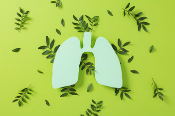 Symbolic eco health concept with light green paper lungs, natural leaves, and bright green backdrop. Represents clean air, respiratory wellness, and nature role in human health.