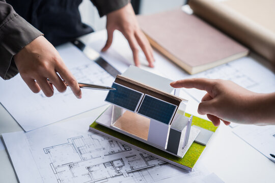 Engineer planning for Solar panels green energy Business man working Innovation  green eco friendly in modern office business  Planing Bio economy for business renewable energy eco friendly. - Powered by Adobe