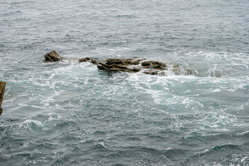 Rocky Outcrops in the Waters of San Sebastian, Spain