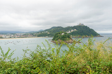 view of the city of San Sebastian, with La Concha beach, from Mount Urgull. Summer vacation scene...
