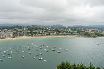 Coastline, view of the city of San Sebastian, with La Concha beach, from Mount Urgull. Summer...
