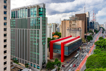 Paulista Avenue in the city of São Paulo with its skyscrapers and movement of people and cars