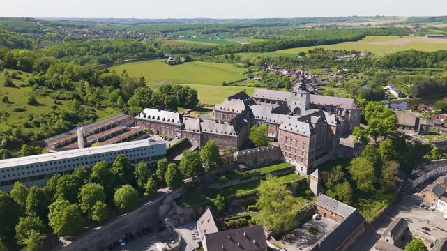 hill right beautiful homes below floreffe abbey belgium prominently featured left to side circling panning shot abbaye de 