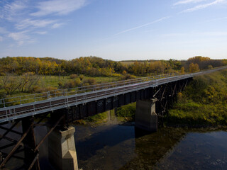  A drone captures a railway bridge over a small river in Saskatchewan.