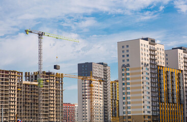 Modern residential buildings high-rise buildings on a sunny day. Construction of new residential...