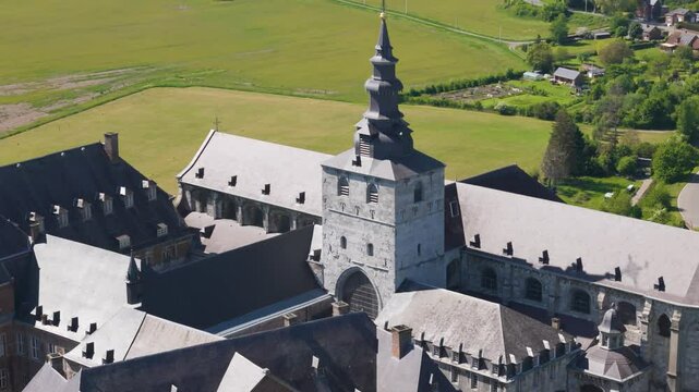 main building floreffe abbey belgium walls structures car enters town adding sense life to scene reveals left right panning shot abbaye de 
