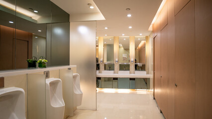 Modern public restroom with urinals and clean design