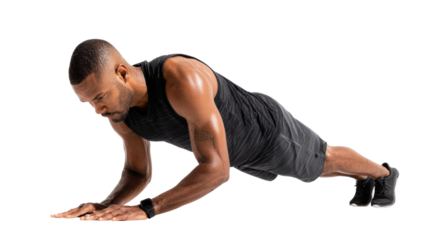 Fit man performing push-ups, focused on strength training and muscle building.