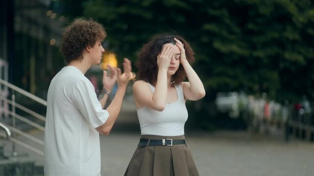 Cold rejection girlfriend walks off while boyfriend pleads behind