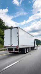 Fast-moving truck on highway under blue sky with motion blur effect