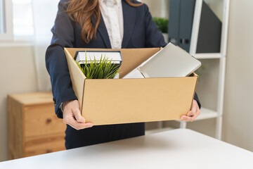Unemployment, quitting job concept, desperate asian young business woman resigning or fired, leave...