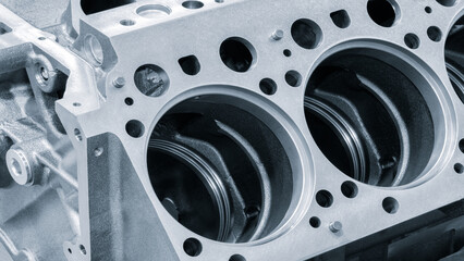 disassembled silver car engine auto service concept background.