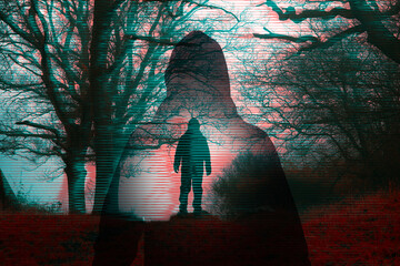 a glitch horror concept.Of a double exposure of a scary hooded figure, standing in a forest on a foggy winters day
