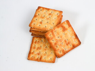 isolated square sweet cracker with sprinkled sugar on top on white background