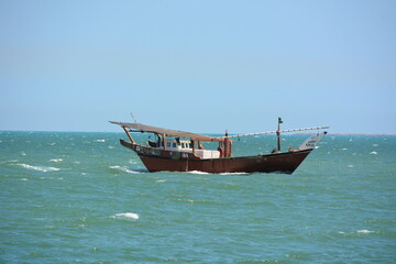 old fishing boat on the dammam beach in saudi arabia