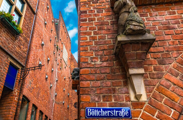 Close-up view of the typical German blue street sign of Böttcherstraße on the wall of the St...