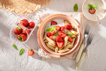 Tasty and sweet pasta with berries, yogurt and mnt.